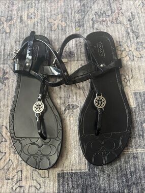 Coach Black Patent Leather T-Strap Sandals with Silver Logo Medallions